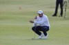 Casey Jarvis of South Africa lines up a putt on day three of the Dunhill Links Golf Championship in St Andrews, Scotland, Saturday, Oct. 3, 2026. (Steve Welsh/PA via AP)
