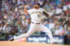 FILE - Milwaukee Brewers pitcher Brandon Woodruff throws during the first inning of a baseball game against the Chicago Cubs, June 28, 2026, in Milwaukee. (AP Photo/Kayla Wolf, File)