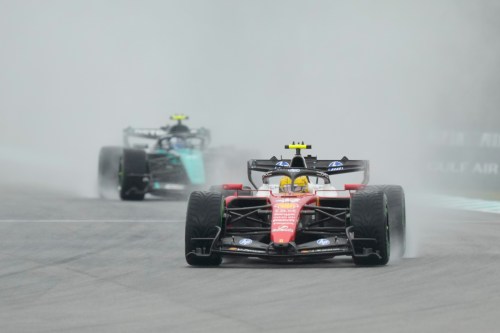 Ferrari driver Lewis Hamilton of Britain steers his car during the formation lap prior to the delayed start of the Bahrain Grand Prix in Sepang, Malaysia, Sunday, Oct. 4, 2026. (AP Photo/Aijaz Rahi)
