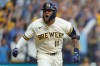 Milwaukee Brewers' Jackson Chourio celebrates after hitting a walkoff hit during the ninth inning of Game 2 of a National League Divisional baseball playoff series against the San Diego Padres Sunday, Oct. 4, 2026, in Milwaukee. (AP Photo/Kayla Wolf)