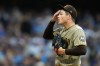 San Diego Padres' Mason Miller reacts during the ninth inning of Game 2 of a National League Divisional baseball playoff series against the Milwaukee Brewers Sunday, Oct. 4, 2026, in Milwaukee. (AP Photo/Kayla Wolf)