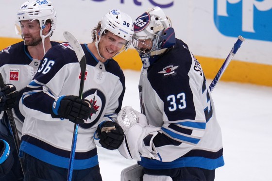 (Gene J. Puskar / The Associated Press files) Winnipeg Jets goaltender Clay Stevenson celebrates with Morgan Barron at the end of a game against the Pittsburgh Penguins earlier this month.