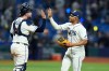 Tampa Bay Rays' Richie Palacios, right, and Liam Hicks celebrate a victory over the New York Yankees in Game 2 of an American League Division Series baseball game Monday, Oct. 5, 2026, in St. Petersburg, Fla. (AP Photo/Chris O'Meara)