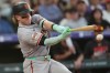 FILE - San Francisco Giants' Harrison Bader (9) bats in the fourth inning of a baseball game, May 29, 2026, in Denver. (AP Photo/David Zalubowski, File)
