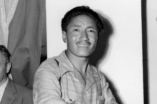 FILE - Sherpa Tenzing Norgay appears at the Ciampino Airport in Rome, Italy during a stopover on July 2, 1953. (AP Photo/James Pringle, File)