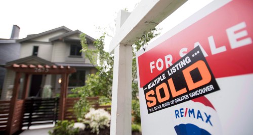 A real estate sign is pictured in Vancouver on June 12, 2018. THE CANADIAN PRESS Jonathan Hayward