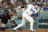 Los Angeles Dodgers two-way player Shohei Ohtani strikes out while batting during the seventh inning of Game 2 of a National League Division Series baseball game against the Atlanta Braves Sunday, Oct. 4, 2026, in Los Angeles. (AP Photo/Mark J. Terrill)