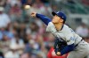 Los Angeles Dodgers' Yoshinobu Yamamoto throws to the Atlanta Braves during the third inning in Game 3 of baseball's National League Division Series, Tuesday, Oct. 6, 2026, in Atlanta. (AP Photo/Brynn Anderson)