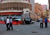 FILE -Employees of Iraq central bank, in the background, leave while security forces stand guard in central Baghdad, Iraq, Nov. 6, 2019. (AP Photo/Khalid Mohammed, File)
