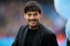 FILE - Former player David Silva smiles before the English Premier League soccer match between Manchester City and Wolverhampton Wanderers at the Etihad Stadium in Manchester, England, Saturday, May 4, 2024. (AP Photo/Dave Thompson, File)