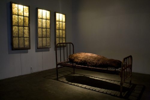 Adrian Stimson artist that created Sick and Tired, 2006, windows and infirmary bed from Old Sun Residential School, feathers, fluorescent lights, bison robe seen in this undated photo. - THE CANADIAN PRESS/Handout - Adrian Stimson  (Mandatory Credit)