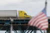A transport truck crosses the Ambassador Bridge into the United States, in Windsor, Ont., Saturday, Aug. 22, 2026. THE CANADIAN PRESS/Dax Melmer