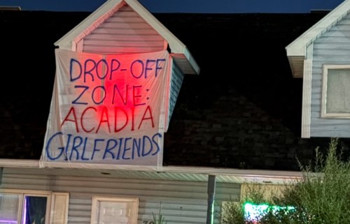A sign that was displayed outside an off-campus house near St. Francis Xavier University in Antigonish, N.S., is shown in this handout photo provided by St. Francis Xavier Prof. Tara Taylor. THE CANADIAN PRESS/Handout-Tara Taylor (Mandatory Credit)