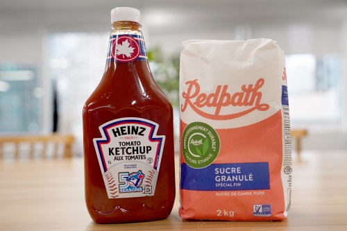 A bottle of Heinz tomato ketchup and a bag of Redpath granulated sugar are pictured in Toronto, on Thursday, Sept. 17, 2026. THE CANADIAN PRESS
