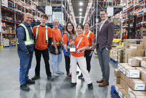 RUTH BONNEVILLE / FREE PRESS
                                McKesson Canada Story on McKesson Canada Winnipeg Distribution Centre. a 120,000 to 125,000-square-foot pharmaceutical facility located and distribution centre located in the northwest part of Winnipeg. Group photo of McKesson staff and leaders with their trophy in their large distribution warehouse Tuesday. Names from left: Robert West, Liam Pickering, LaraBee Henderson, Kristina Redmond, Cathleen Isagunde, Nicole Busch and Tim Smith Senior Vice President Marketing. Story runs on Oct. 5 &lsquo;Made in Manitoba&rsquo; feature Story by Aaron Sept 29th, 2026