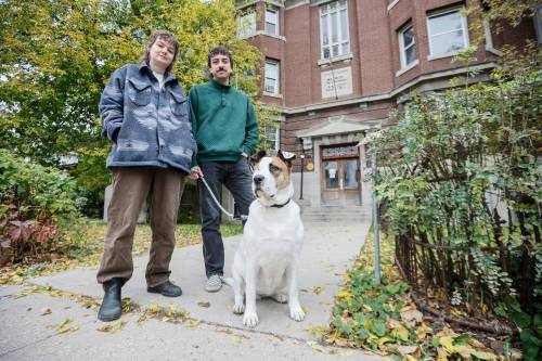 JOHN WOODS / FREE PRESS
                                Avery Helm and Quincy Houdayer with dog Honey outside their Furby Street apartment. After repeatedly asking for repairs, they went to the Residential Tenancies Branch.