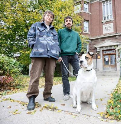 JOHN WOODS / FREE PRESS
                                Avery Helm and Quincy Houdayer with dog Honey outside their Furby Street apartment. After repeatedly asking for repairs, they went to the Residential Tenancies Branch.