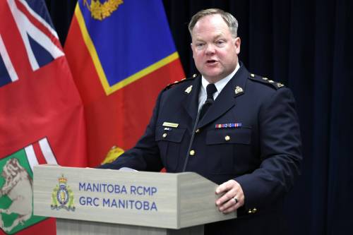 Ruth Bonneville / Free Press
                                Jeff Asmundson, Manitoba Integrated Law Enforcement Team, answers questions from the media at the Manitoba RCMP presser update on Project Derry where 21 new charges were laid against 11 people in a criminal organization operating on the Bunibonibee Cree Nation (Oxford House.)