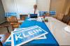 Kevin Klein at campaign HQ going over the plan for a 10:30 AM press conference.