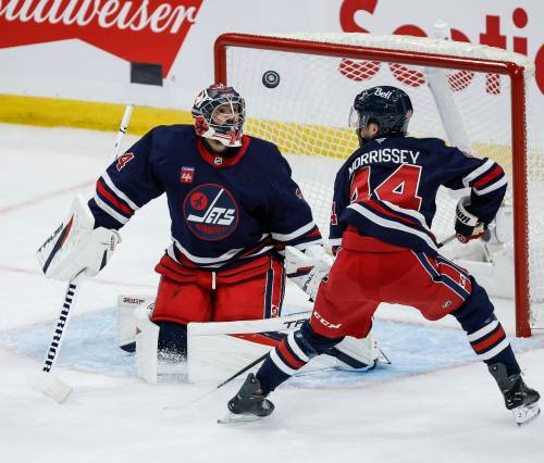 John Woods / THE CANADIAN PRESS
                                Winnipeg Jets netminder Stuart Skinner (left) and his backup Clay Stevenson have given the franchise extra patience in finding a new home for Connor Hellebuyck with their impressive 3-0-1 combined start to the season.