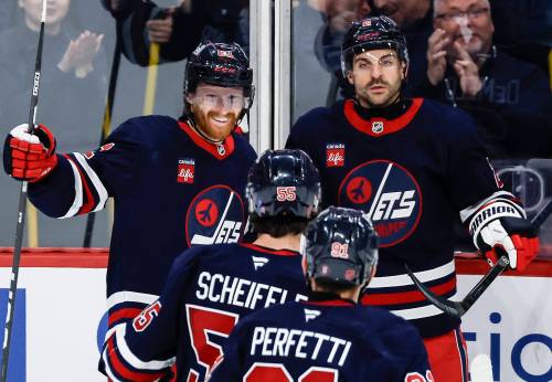 JOHN WOODS / THE CANADIAN PRESS
                                Winnipeg Jets&rsquo; Kyle Connor (81), Dylan DeMelo (2), Mark Scheifele (55) and Cole Perfetti (91) celebrate Connor&rsquo;s goal against the Colorado Avalanche during third period NHL hockey action in Winnipeg on Wednesday.