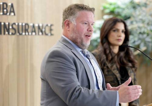 Ruth Bonneville / Free Press Files
                                Grant Heather (left), manager of vehicles for hire at the City of Winnipeg, and Satvir Jatana, president and CEO of Manitoba Public Insurance, speak to media about ride-share insurance fraud.