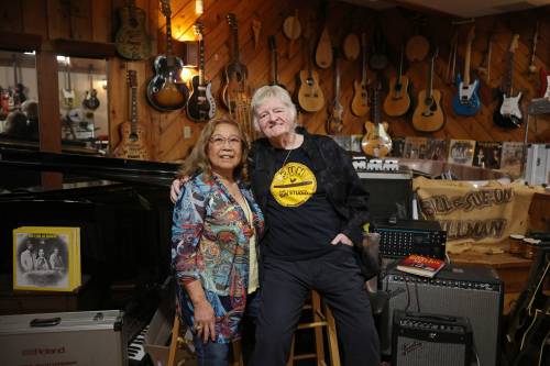 Tim Smith/The Brandon Sun Manitoba music royalty Sue-On and Bill Hillman, surrounded by instruments, their albums and other musical collectibles in the basement of their home in Brandon.