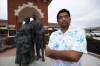 SVJETLANA MLINAREVIC / THE CARILLON
                                City of Steinbach candidate Mitesh Kumar stands in front of Steinbach&rsquo;s famed clock tower. A hate banner was displayed by a neo-Nazi group on Tuesday that disparaged non-white candidates in the city&rsquo;s election. Kumar and Greg Carlos are the only non-white candidates.