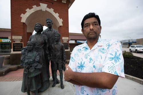 SVJETLANA MLINAREVIC / THE CARILLON
                                City of Steinbach candidate Mitesh Kumar stands in front of Steinbach&rsquo;s famed clock tower. A hate banner was displayed by a neo-Nazi group on Tuesday that disparaged non-white candidates in the city&rsquo;s election. Kumar and Greg Carlos are the only non-white candidates.