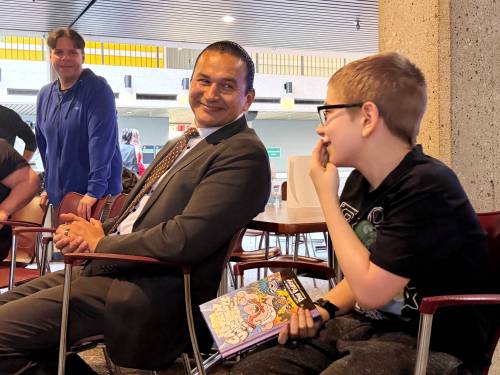 MORGAN MODJESKI / FREE PRESS
                                Premier Wab Kinew, with 10-year-old Casper Hilding, at St. Amant Centre, announces $6.75 million for autism supports and respite in Manitoba.