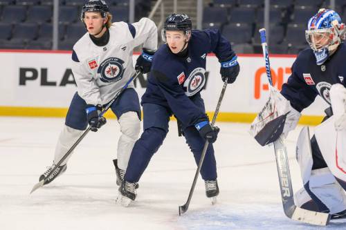 (Mike Sudoma /Free Press)
                                Winnipeg Jets centre Viggo Bjorck (centre) has played with tenacity through the first seven games of his NHL career. The rookie forward also continues to draw praise for his defensive play.