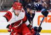 JOHN WOODS / THE CANADIAN PRESS
Winnipeg Jets' Dylan DeMelo (2) defends against Carolina Hurricanes' Nikolaj Ehlers (27) during the first period in Winnipeg on Saturday.