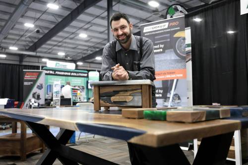 Ruth Bonneville / Free Press
                                Aaron Maendel is general manager of EcoPoxy, an epoxy resin company operated by Oak Bluff Hutterite Colony.
                                Ruth Bonneville / Free Press Biz- Hutterite Manufacturing & Associate Expo EcoPoxy GM, Aaron Maendel with some of their products at their booth at the Expo Friday. EcoPoxy is a Canadian farm-based company that produces bio-based epoxies to inspire and empower woodworkers and artists to create beautiful projects. Story: Hutterite Manufacturing & Associate Expo at Red River Exhibition Park for a feature on the growth of Hutterite manufacturers in Manitoba. Story by Gabby Aug 14th,, 2026