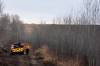 CHRISTOPHER KATSAROV / THE CANADIAN PRESS FILES
                                Firefighters work along a firewall next to CFB Wainwright, south of the town Wainwright, Alta., on Monday.