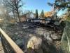 MORGAN MODJESKI / FREE PRESS Fire damage can be seen at a construction site in the 200 block of Regal Avenue on Wednesday. Two structures on the lot were both heavily damaged.