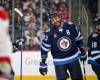 MIKE SUDOMA / FREE PRESS
Winnipeg Jets alumni and crowd favourite Dustin Byfuglien smiles as he’s cheered on during the first period of Saturday night's alumni game at Canada Life Centre.