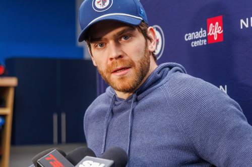 MIKE DEAL / FREE PRESS FILES
Jets captain Adam Lowry said the Connor Hellebuyck situation was a bit of a cloud hanging over their heads and team is glad to have the situation behind them.