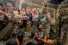 Los Angeles Dodgers players celebrate winning Game 4 of baseball's National League Division Series against the Atlanta Braves, Wednesday, Oct. 7, 2026, in Atlanta. (AP Photo/Mike Stewart)