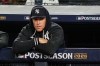 New York Yankees' Aaron Judge stands in the dugout watching play against the Tampa Bay Rays during the second inning in Game 3 of baseball's American League Division Series, Wednesday, Oct. 7, 2026, in New York. (AP Photo/Seth Wenig)