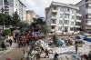 Firefighters and rescue team members work next to a partially collapsed seven storey building in Istanbul, Thursday, Oct. 8, 2026. (Abdullah Tepeli/DIA Photo via AP)
