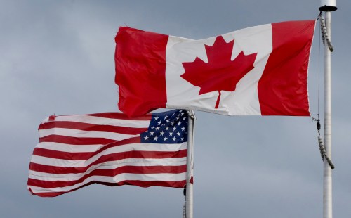 FILE - The flags of Canada and the United States fly in Ottawa, Sept. 12, 2026. (Adrian Wyld/The Canadian Press via AP, File)
