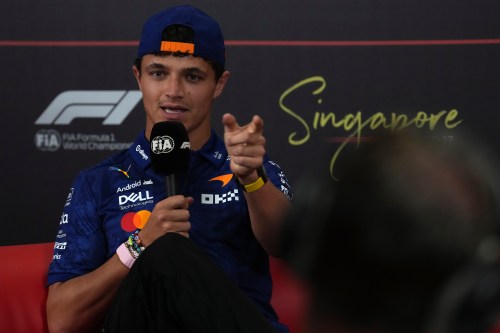 McLaren driver Lando Norris of Britain, speaks at a press conference ahead of the Singapore Formula One Grand Prix weekend at the Marina Bay Street Circuit in Singapore, Thursday, Oct. 8, 2026. (AP Photo/Ng Han Guan)