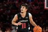 FILE - Cincinnati guard Kerr Kriisa (11) handles the ball during the first half of an NCAA college basketball game against Houston, Jan. 31, 2026, in Houston. (AP Photo/Kevin M. Cox, File)