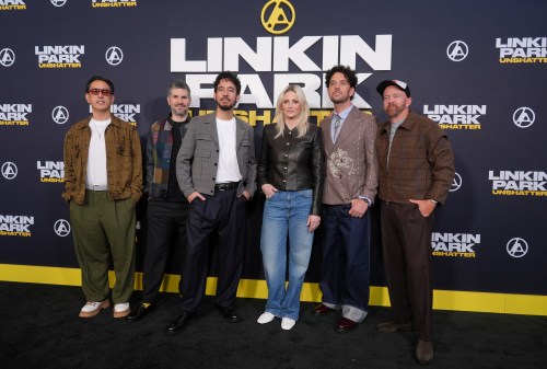 From left, Joe Hahn, Brad Delson, Mike Shinoda, Emily Armstrong, Colin Brittain and Dave Farrell of the band Linkin Park pose together at the premiere of the documentary film 