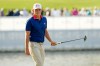 USA teams' Jacob Bridgeman watches his shot on the 13th green against the International team during a Presidents Cup golf tournament third round foursome match at Medinah Country Club, Saturday, Sept. 26, 2026, in Medinah, Ill. (AP Photo/Chris Carlson)