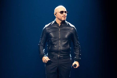 FILE - Pitbull performs in concert in London on June 9, 2025. (Photo by Scott A Garfitt/Invision/AP, File)