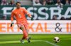 Bayern's goalkeeper Manuel Neuer kicks the ball during the German Bundesliga soccer match between FC Augsburg and FC Bayern Munich in Augsburg, Germany, Oct. 10, 2026. (AP Photo/Matthias Schrader)