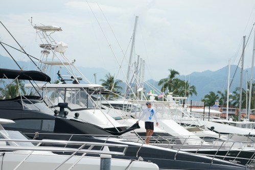 A man places a window covering on his boat as Hurricane Simon approaches Puerto Vallarta, Mexico, Saturday, Oct. 10, 2026. (AP Photo/Fernando Llano)