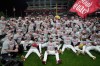 Cleveland Guardians players and coaches celebrate after Game 5 of baseball's American League Division Series against the Chicago White Sox, Saturday, Oct. 10, 2026, in Cleveland. (AP Photo/Sue Ogrocki)