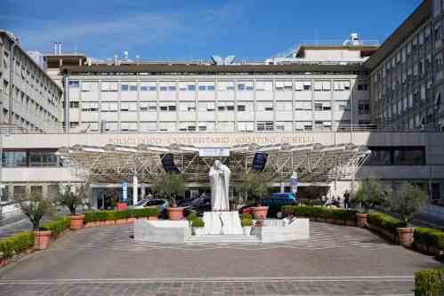 The statue of late Pope John Paul II, center, is pictured at the Agostino Gemelli Polyclinic in Rome, Sunday, Oct. 11, 2026. (AP Photo/Gregorio Borgia)